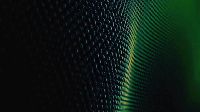 Dynamic green light illuminates dark textured grid pattern abstract motion graphic background