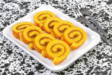 Pineapple Roll Cake On White Plate