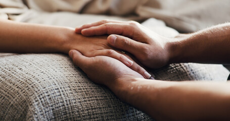 Counselor, patient and holding hands in therapy with comfort, understanding and compassion for recovery. Psychologist, people and kindness in counseling with empathy, trust and support for healing.