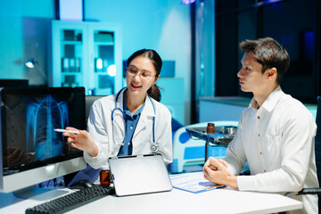 Professional doctor examining patient with stethoscope in modern clinic, healthcare consultation, medical checkup, diagnosis, trust, technology and wellness care.