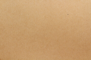 Fototapeta premium Cardboard sheet texture background, pattern of brown kraft paper with vintage style.