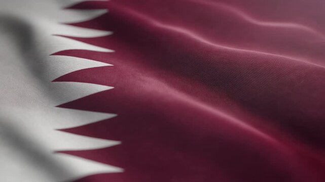 Waving flag of qatar symbolizing patriotism and national pride, suitable for travel blogs or cultural diversity concepts. Perfect for promotions.