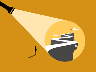 Businessman look to the flashlight that illuminates the path to success