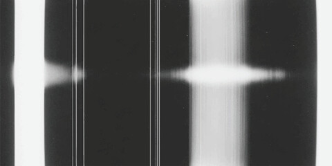 Abstract technical background illustrating white beams and data lines against a dark backdrop