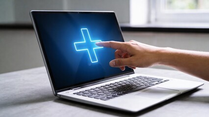Hand touching laptop screen with plus sign
