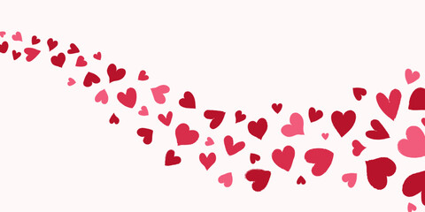 Curved trail of red and pink hearts on a soft pastel background, romantic border for Valentines Day backdrop, wedding invitations, love quotes, social media and festive decorations. Grunge texture