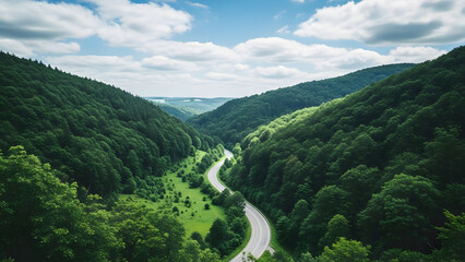 Serene mountain valley with winding river and lush greenery