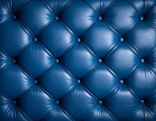 Fototapeta premium Close up of dark blue leather with a tufted, diamond pattern with button details, creating a luxurious texture