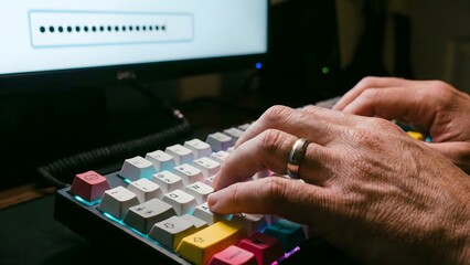 Cyber Fortress: Typing on keyboard in a cyber world. A close-up view of hands rapidly typing on a colorful keyboard, as a password prompt on a computer screen.