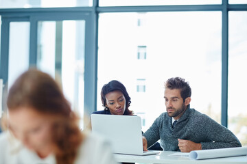 Business, team or people with laptop in office for design review, digital blueprint or planning. Architect staff, man or woman with tech in meeting for code compliance, project management or research