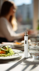 Weight loss injection pen on restaurant table in dining setting