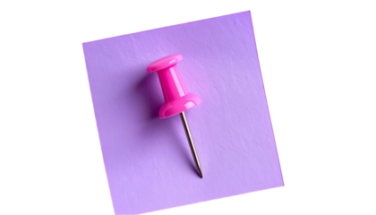A vibrant pink pushpin secures to a square lavender sticky note against a black backdrop