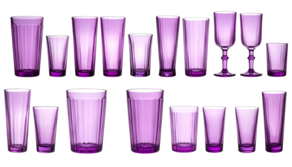 Array of empty, pink-tinted, ribbed glassware in varied sizes & shapes on black