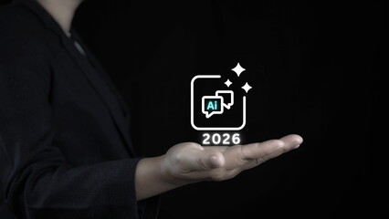 businesswoman holding a glowing AI chatbot icon with the year 2026 representing future customer service automation and artificial intelligence chat assistant trends