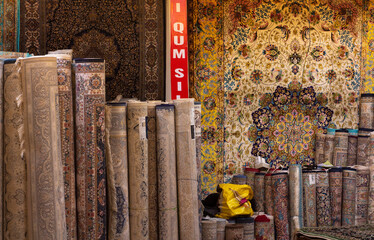 Traditional Turkish Carpet Shop Interior with Colorful Oriental Rugs and Rolled Carpets