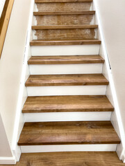 Wooden Stairs with White Risers Indoors