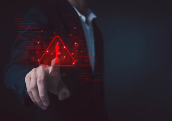 Cyber security warning concept with businessman touching red alert icon, representing system risk, data breach, digital threat, network protection, information security, and cyber attack prevention.