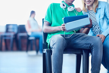 Hands, tablet and students in college for learning, assignment research and thesis review. Technology, happy people and friends in university campus for education, academic course or knowledge online