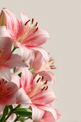 Obraz premium Elegant Bouquet of Pink Lilies with Speckled Petals Against a Soft Neutral Background