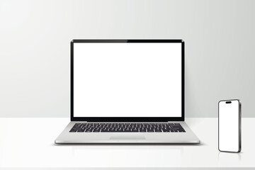 Laptop and smartphone with blank screen on table realistic mockup