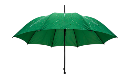 An open, vibrant green umbrella is isolated against a stark black background with raindrops
