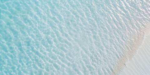 Fototapeta na wymiar Turquoise water surface aerial view background. Summer beach tropical vibe. Bright exotic marine wallpaper.