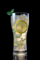 Refreshing Mojito with Ice and Mint on Black