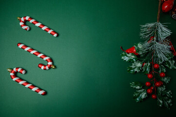 Green Background New Year Still Life with Ornaments and Text Area