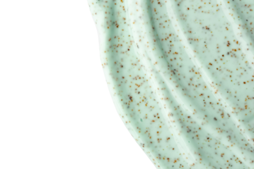 The texture of a mint body scrub with particles. Close-up