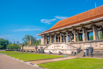 Independence Memorial Hall, The open-air pavilion with carved stone pillars and traditional motifs in Sri Lanka © Sithila
