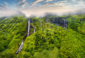 Azores - Drone view of Waterfalls with lake Poco Ribeira do Ferreiro in green landscape, Poco da...
