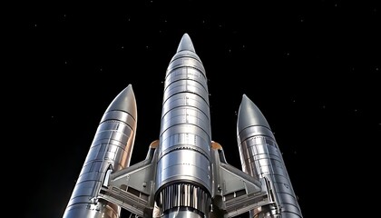 Fototapeta premium A metallic, multi-stage spacecraft, angled up against a starry black backdrop, ready for liftoff