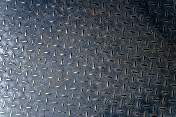 Diamond Plate Metal Texture with Dark Weathered Surface