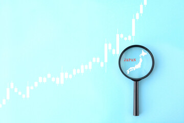 虫眼鏡で日本の株価や為替を分析するイメージ画像