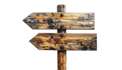 Weathered wooden directional sign with two arrows pointing in opposite directions