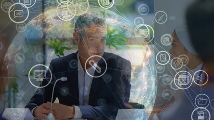 Animation of network of connections with icons over caucasian businessman using smartphone - Powered by Adobe