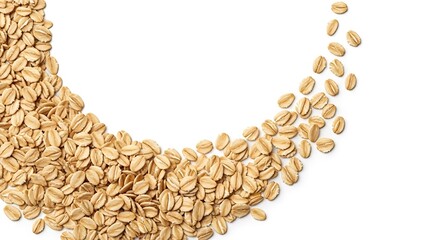 A pile of oats spilling out in a curve isolated on white background with some grains scattered around