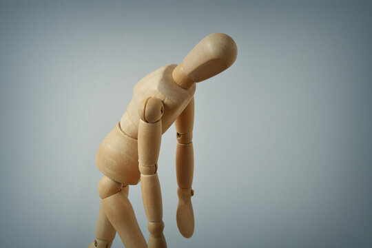 Sad Wooden mannequin - Concept of depression and mental health problems