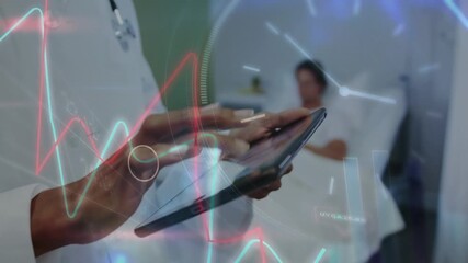 Animation of data processing over african american female doctor using tablet - Powered by Adobe