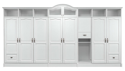 A large, white, built-in closet unit with doors, drawers, shelves, and ornate detailing