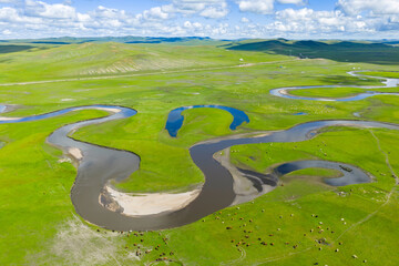 Aerial view magnificent scenery of the meandering rivers in the Hulunbuir Grassland of Inner Mongolia, China
