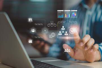 Business professional using AI interface on laptop for data management, user verification, workflow automation, digital analytics, and secure business decision support in modern enterprise technology.