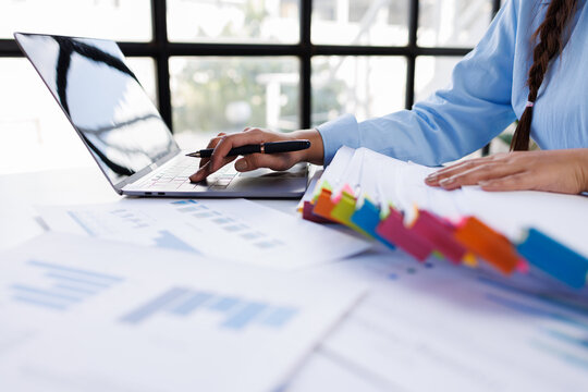Business documents business woman check legal document review Prepare documents or analysis reports, tax items, accounting documents, data contracts, office partner agreements.
