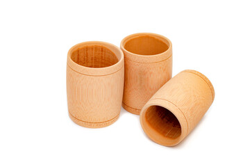 Sustainable bamboo cup with smooth finish, isolated on white background.