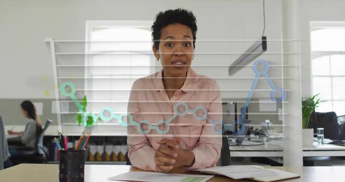 Animation of month names and graph, smiling woman waving bye after discussing on video call
