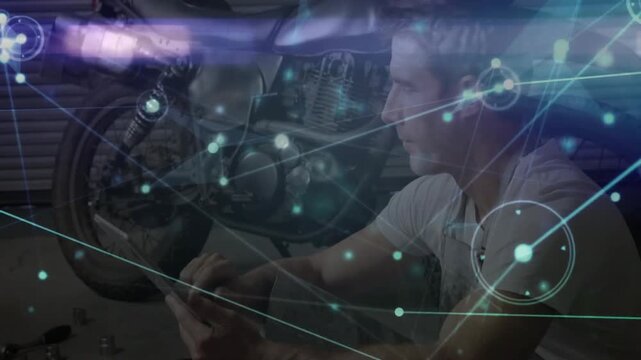 Auto mechanic tapping tablet scanning engine diagnosing faults with pulsing digital mesh