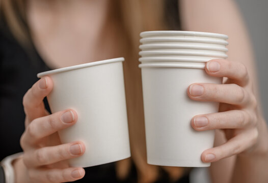 Disposable white paper cups for drinks