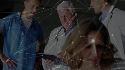 Doctors in white coats discussing with network connections animation in hospital - Powered by Adobe