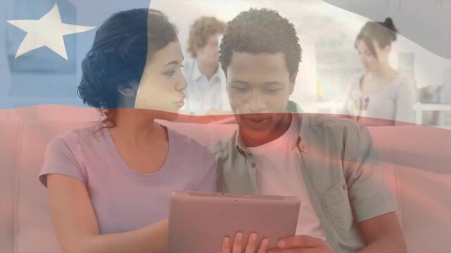 Using tablet, students in school with Chilean flag animation in classroom background