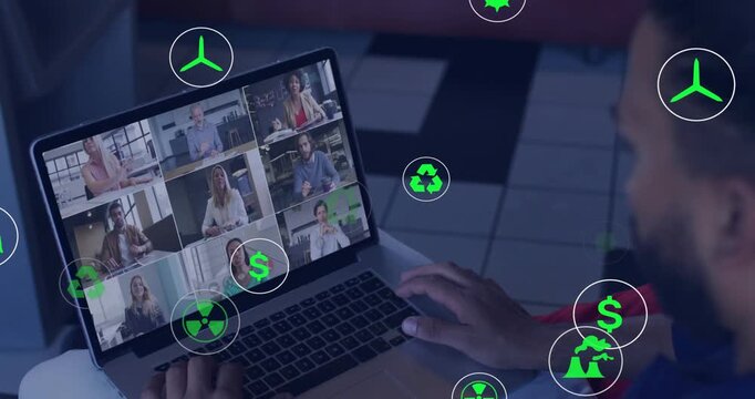 Laptop user moving right hand on trackpad causing green energy icons clustering over 3x3 call grid